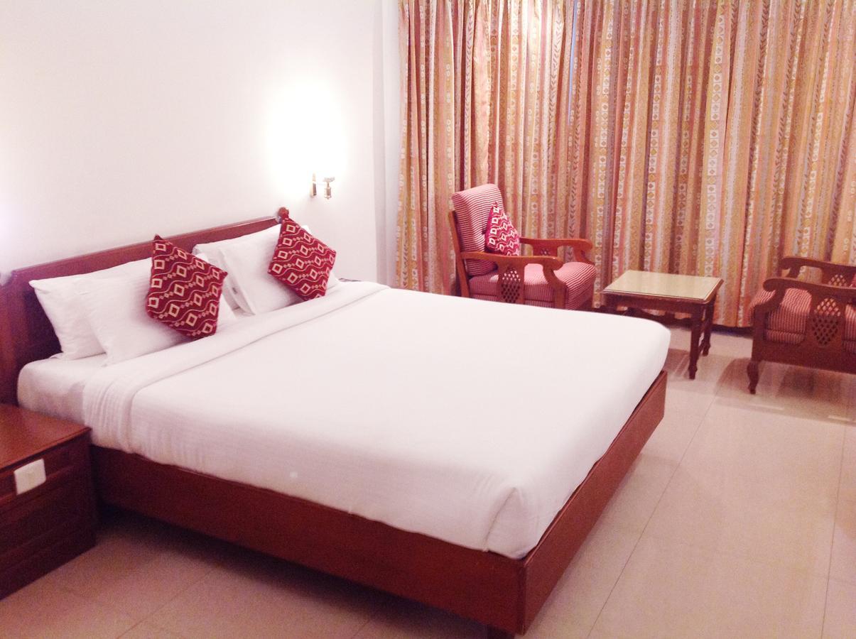 Krishna Inn Guruvāyūr Buitenkant foto