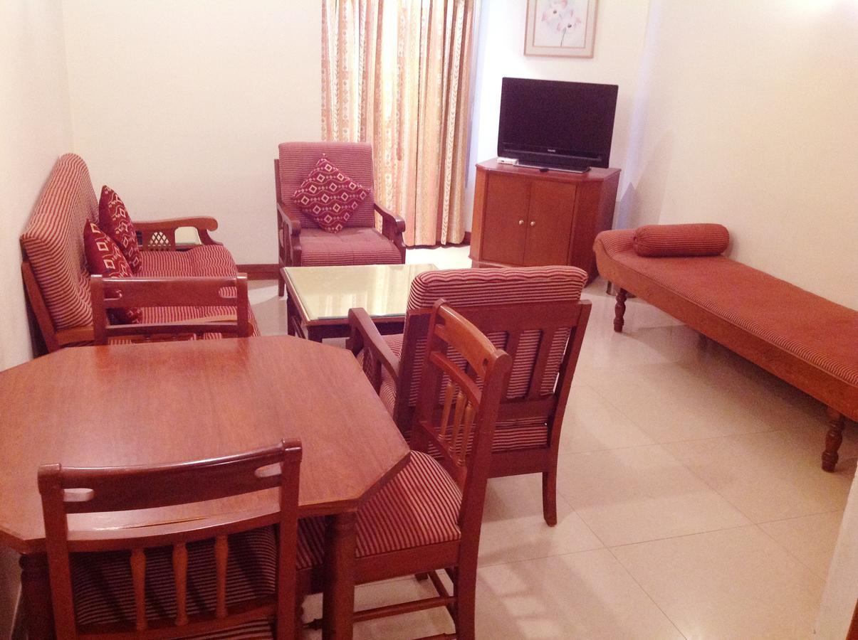 Krishna Inn Guruvāyūr Buitenkant foto